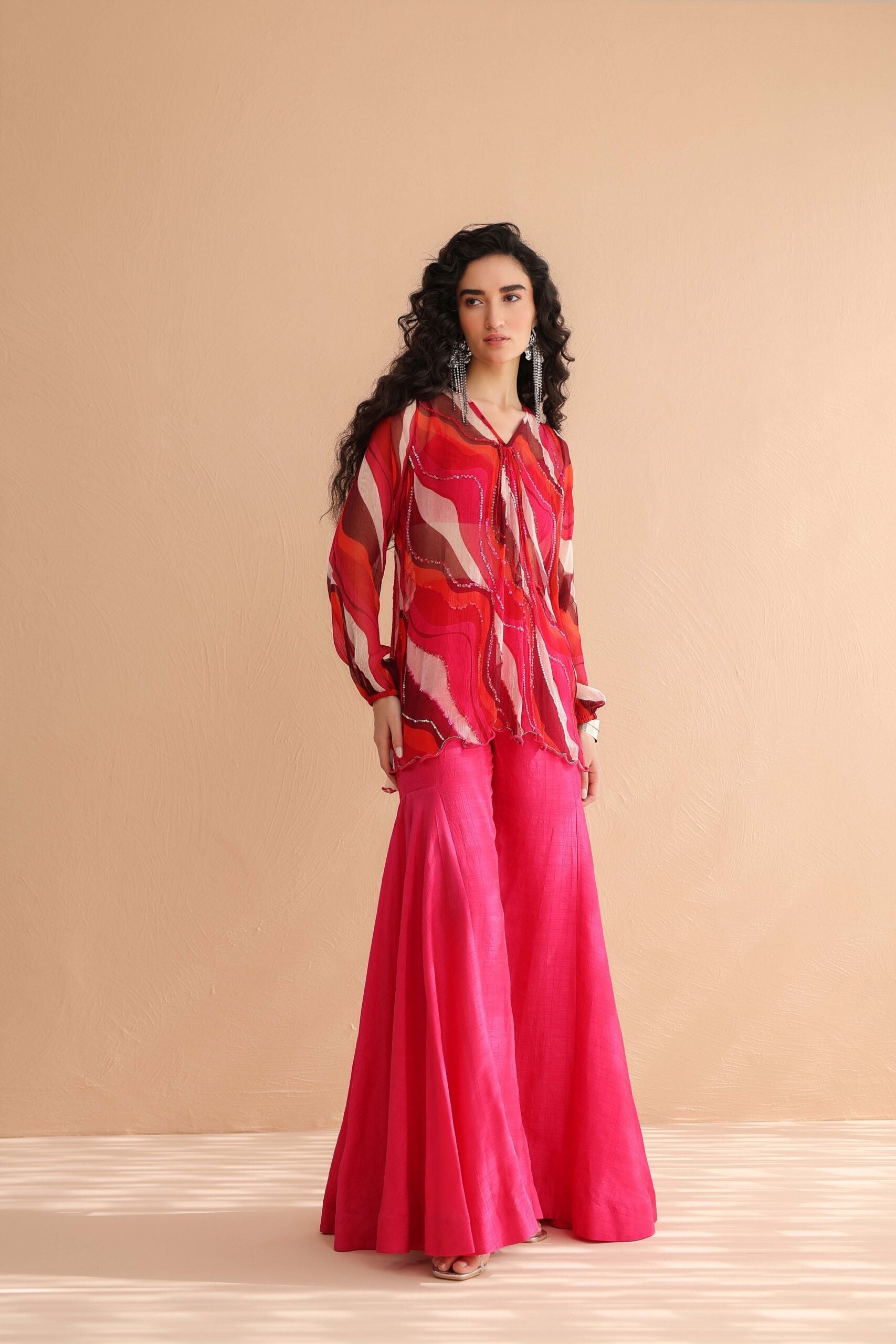 Bloody Mary tunic with exaggerated bell-bottoms.