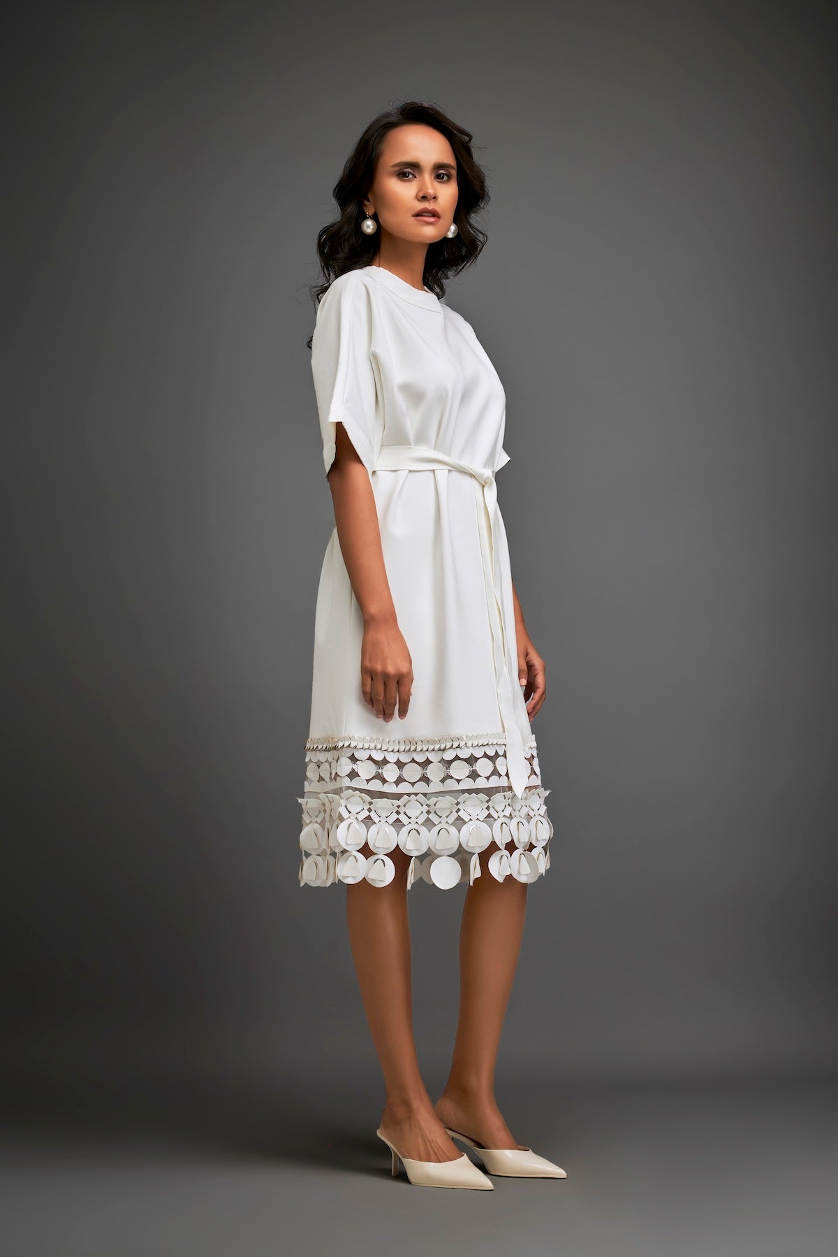 Dress With Belted Waist And Metallic Geometric Hemline