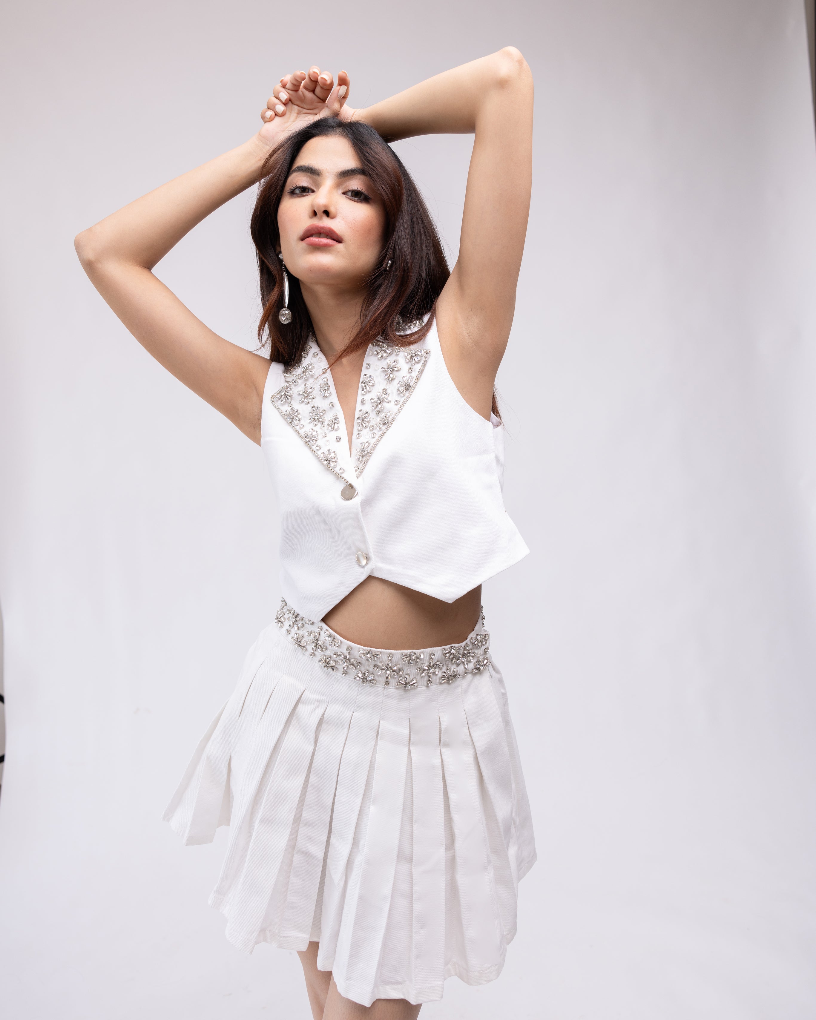 Sleeveless denim waistcoat with embellished collar