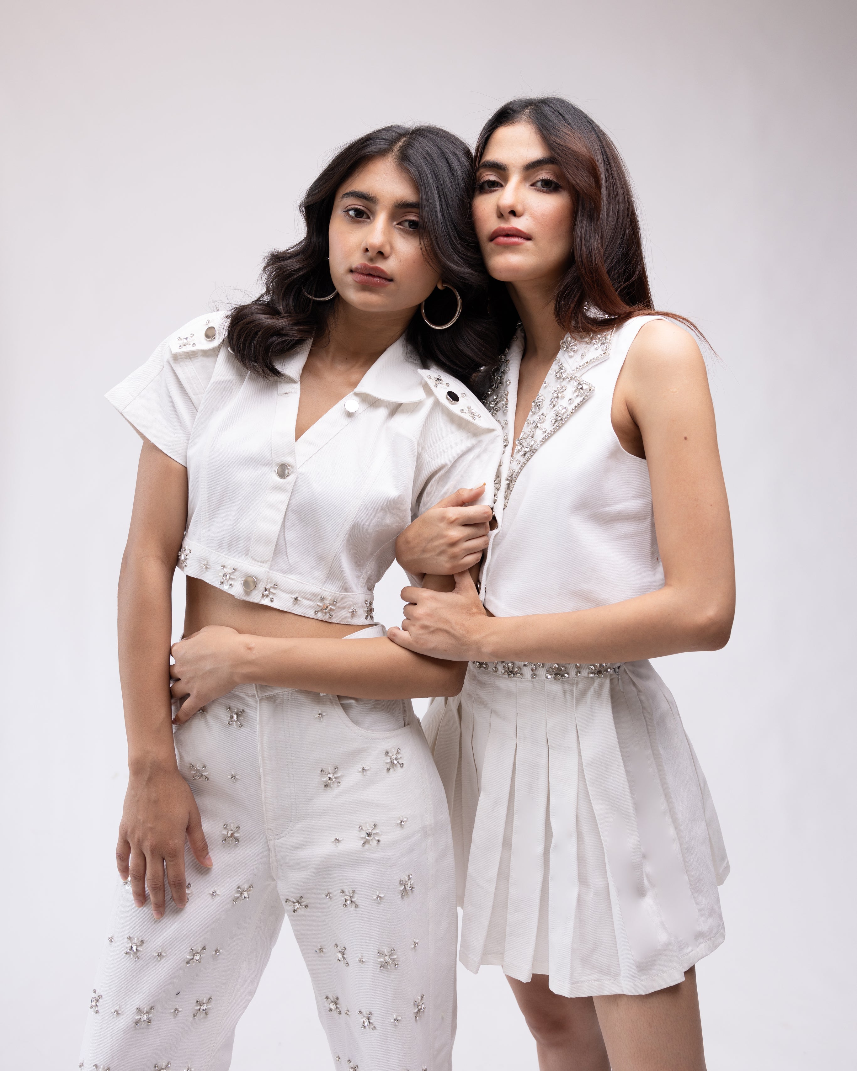 Sleeveless denim waistcoat with embellished collar