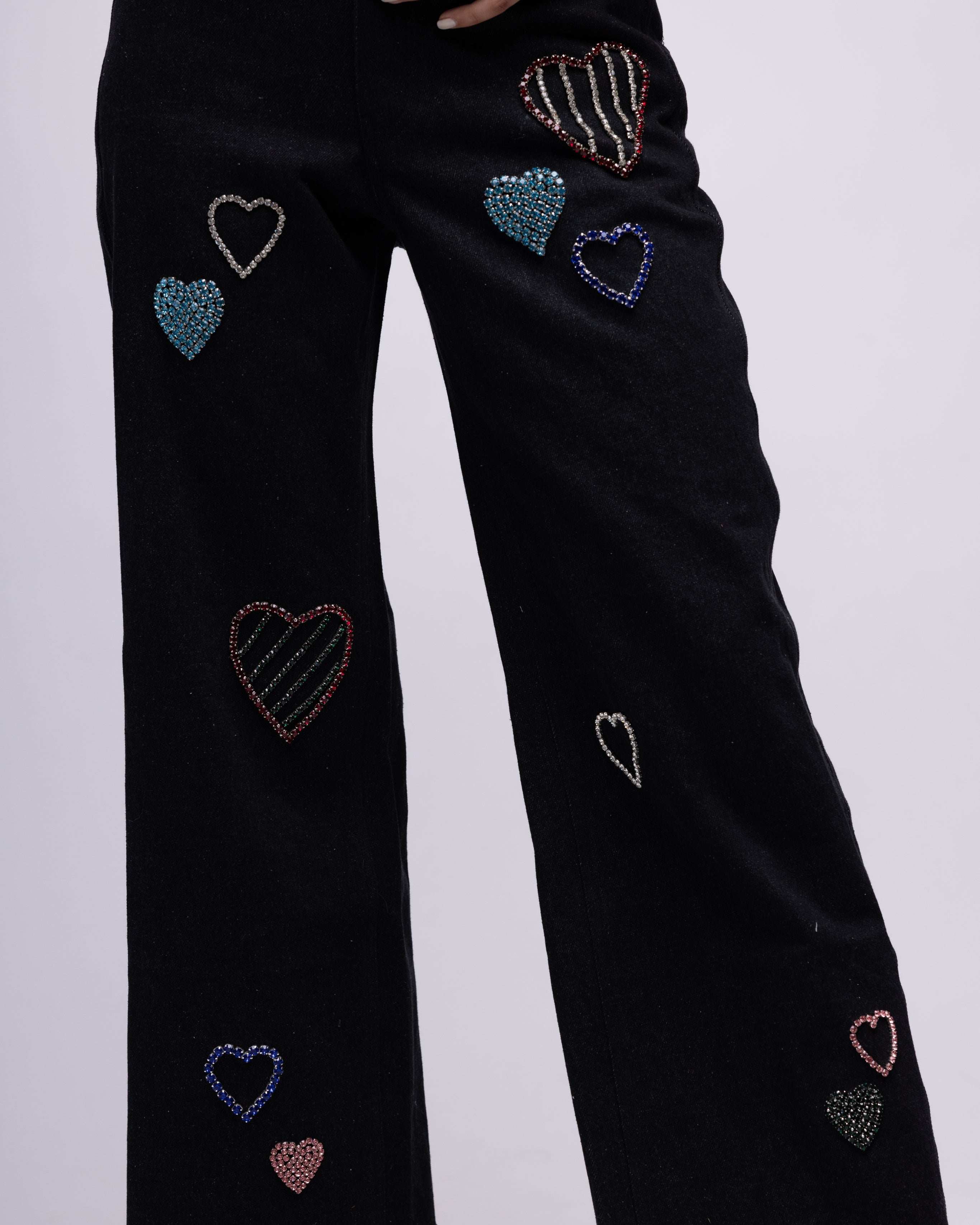 High-waisted jeans with multi-colour embellished hearts