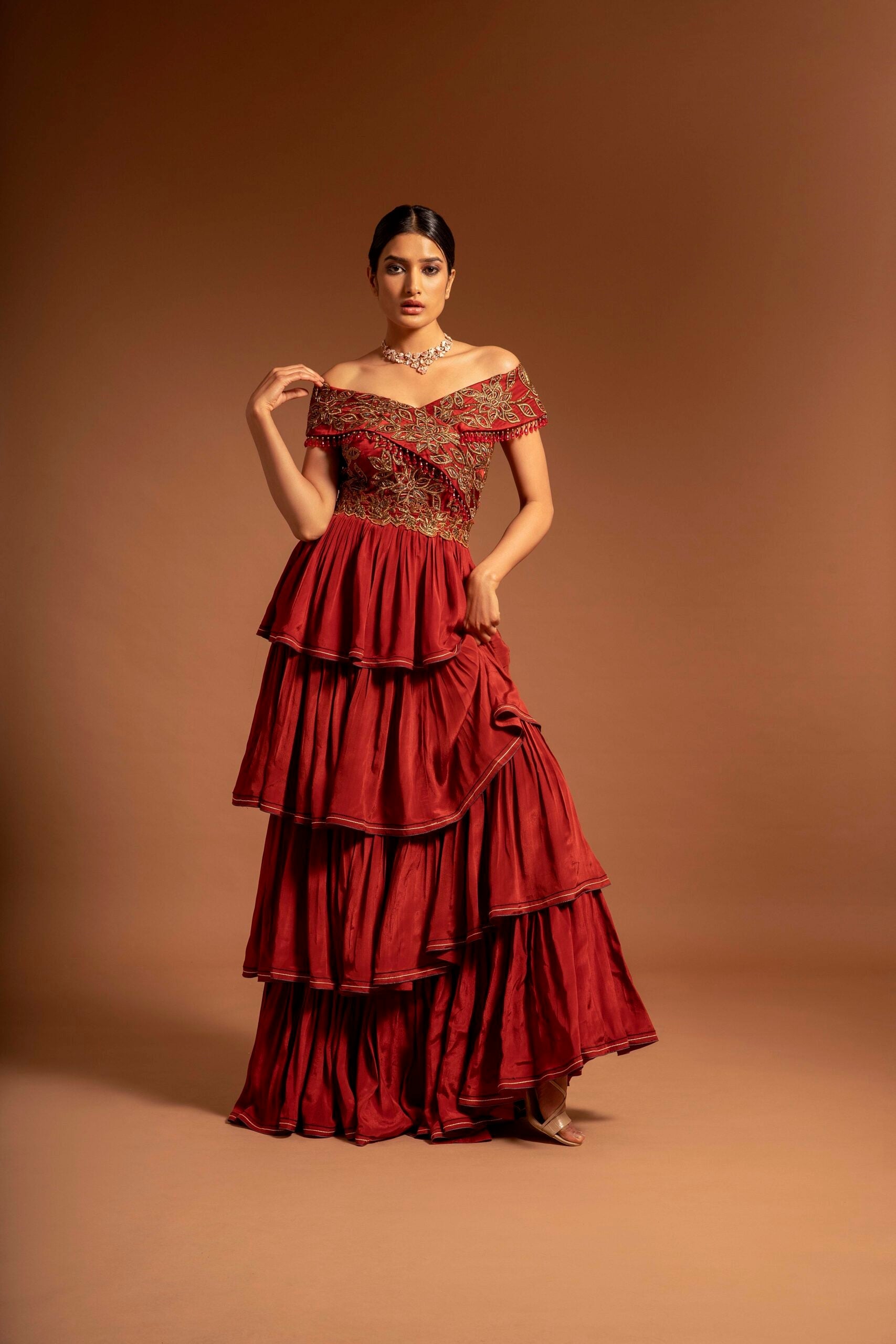 Maroon fully ajrakh patchworked layered gown