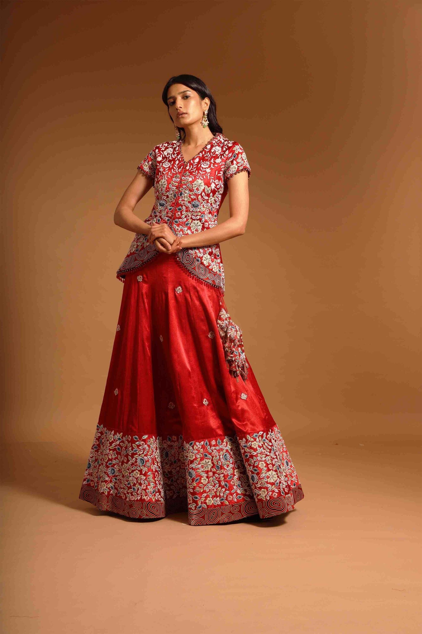 Red fully handcarfted jacket with lehenga and cape dupatta