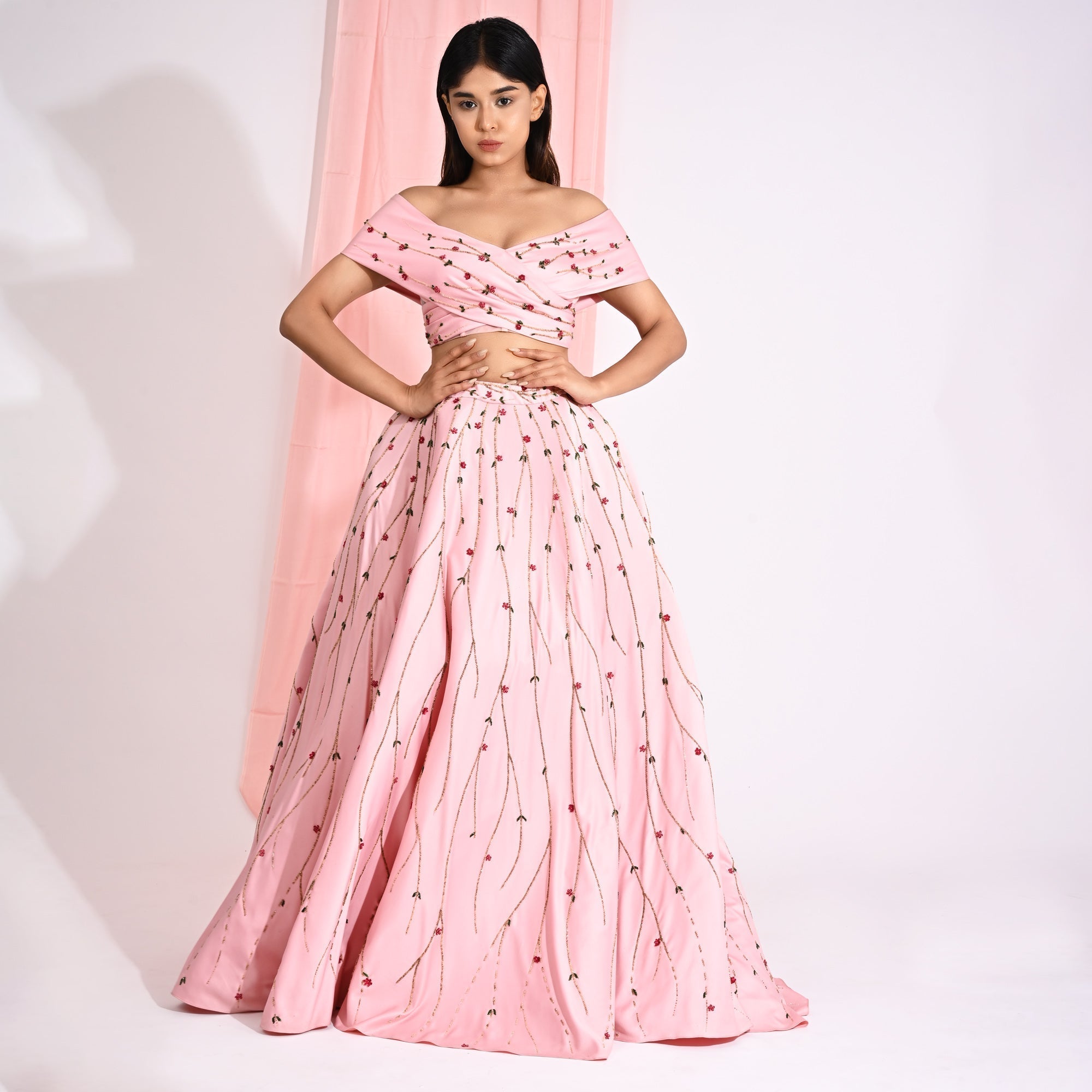 Image of Embellished Peaches Pink Of Shoulder Lehenga Set