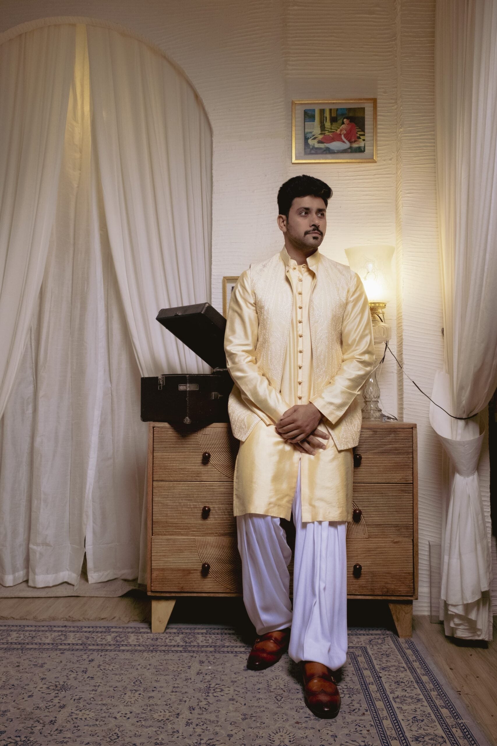 Powder yellow kurta with nehru jacket