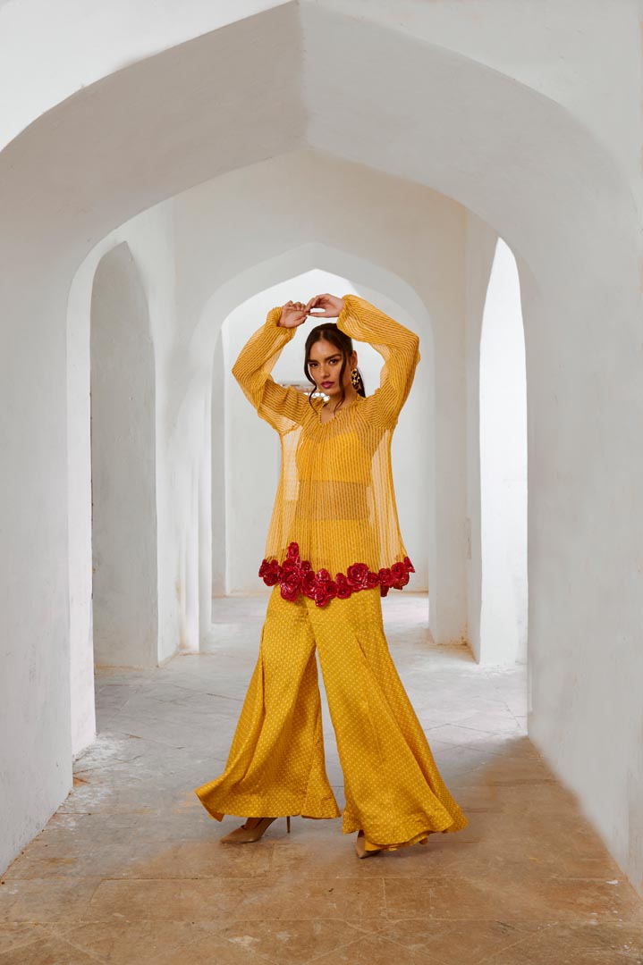 Image of Gulbahar Marigold Yellow Gulaab tunic set with  Bell Bottoms and inner