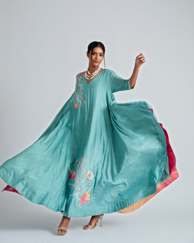 Silk mul mul tunic dress, with intricate floral patchwork, ombré organza motifs, and pockets. 