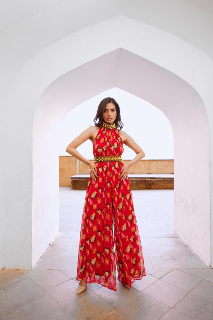 Image of Gulbahar Chilly red bell jumpsuit with belt