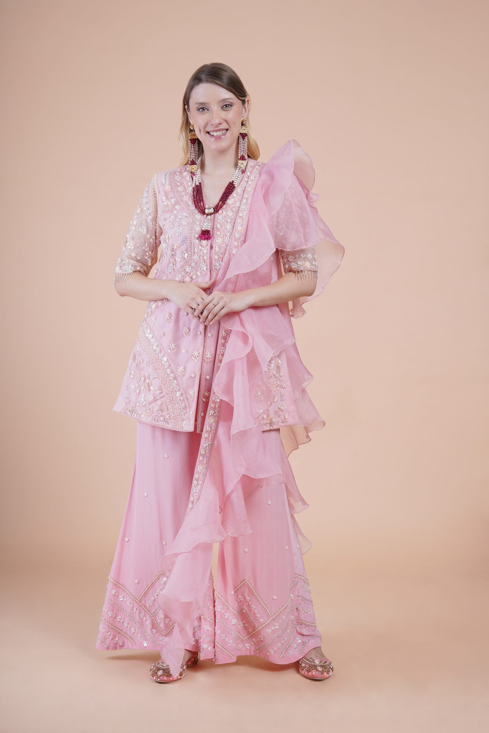 Image of Pink net embroidered kurta suit set