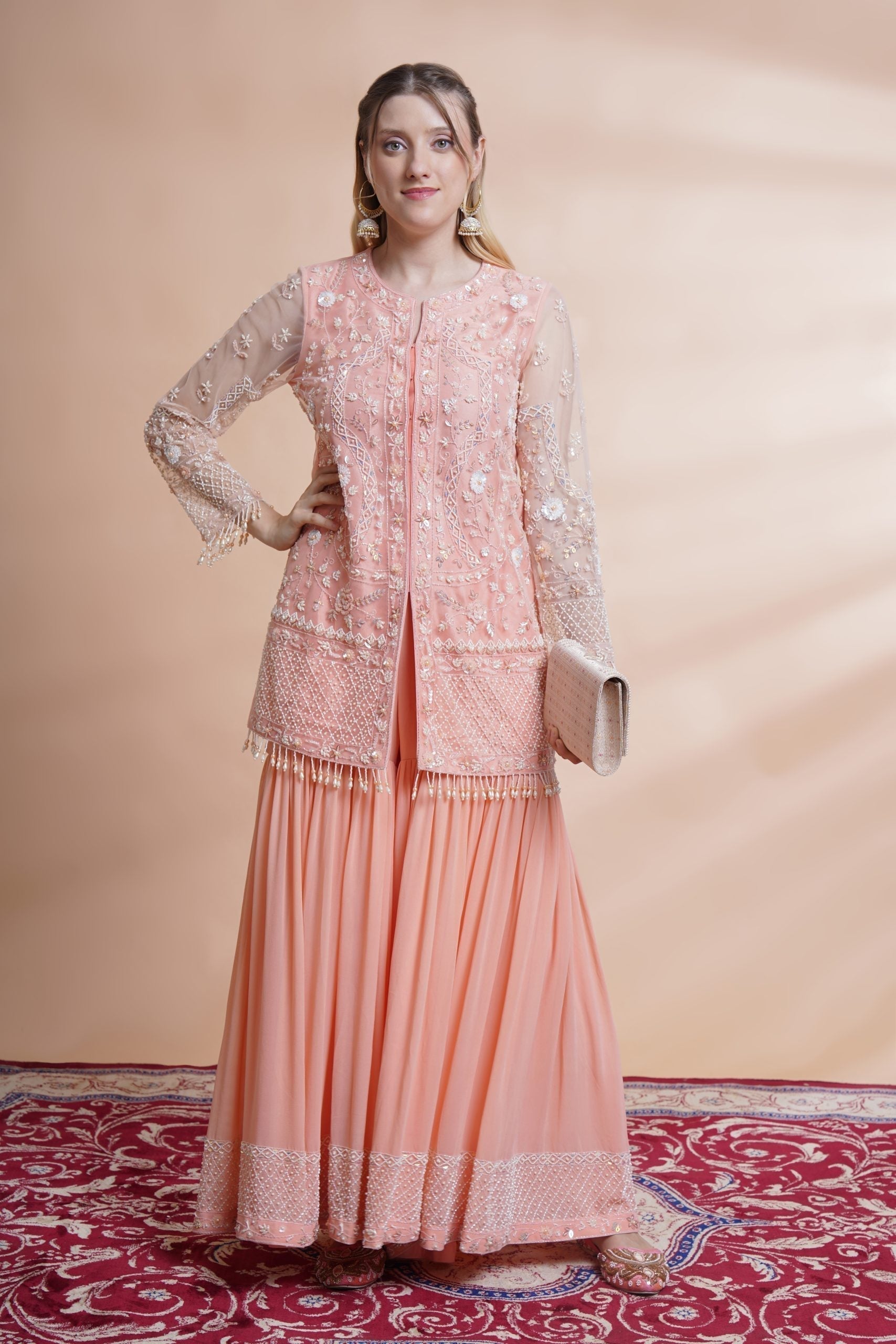 Image of Peach net kurta sharara set