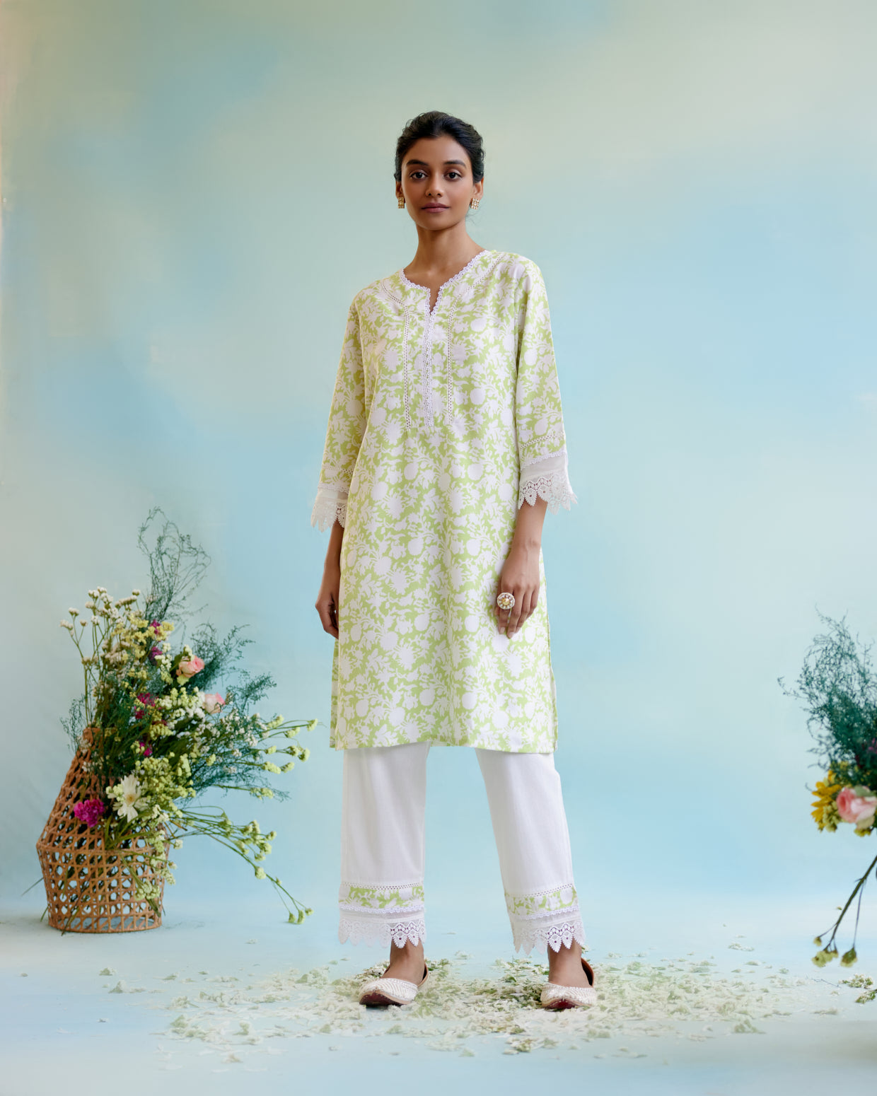 Image of Spring Green Cotton Linen Kurta with 
delicate lace detailing with Narrow Pants