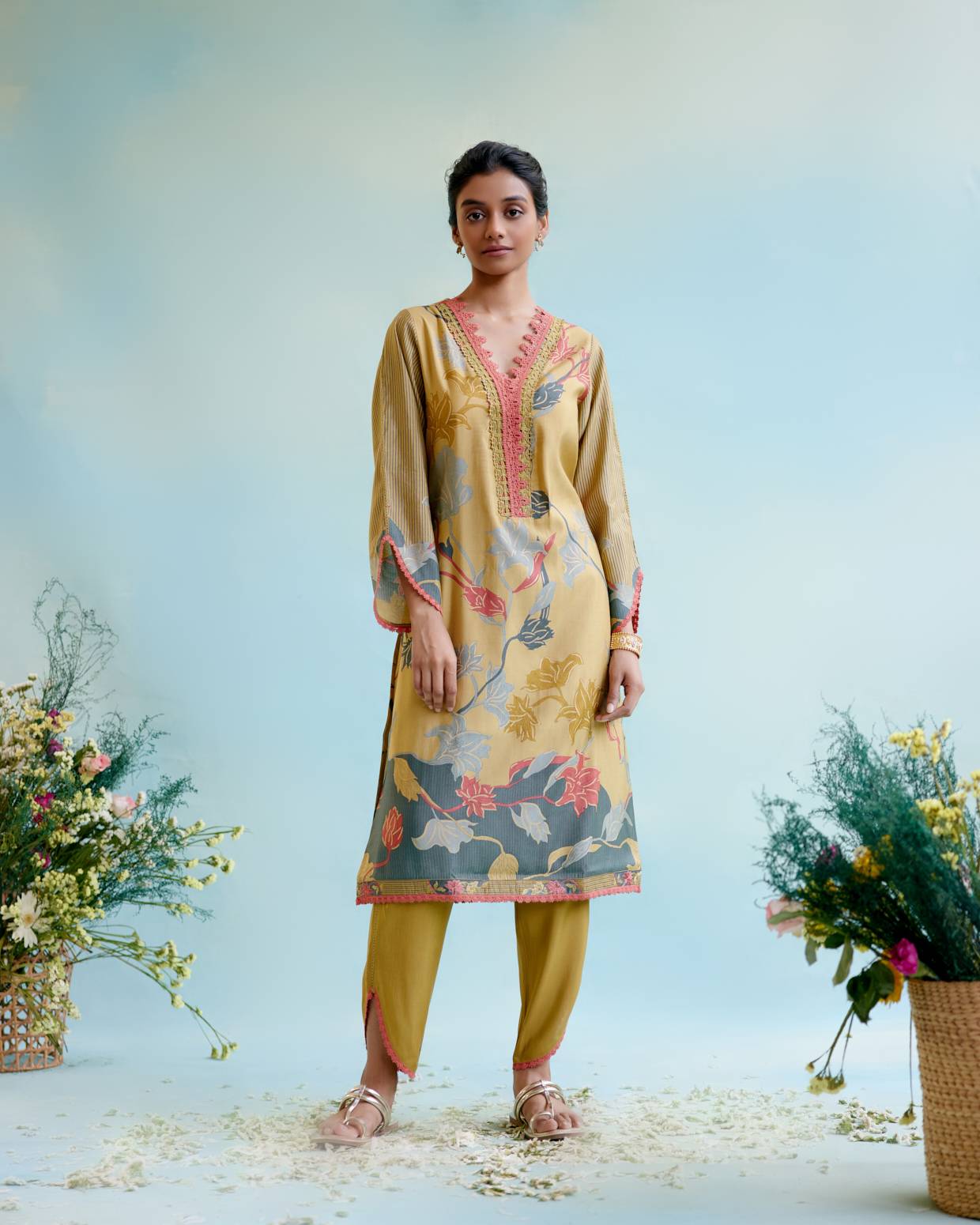 Image of Rural Green Printer Kurta with 
delicate lace detailing with Tulip Pants and Dupatta