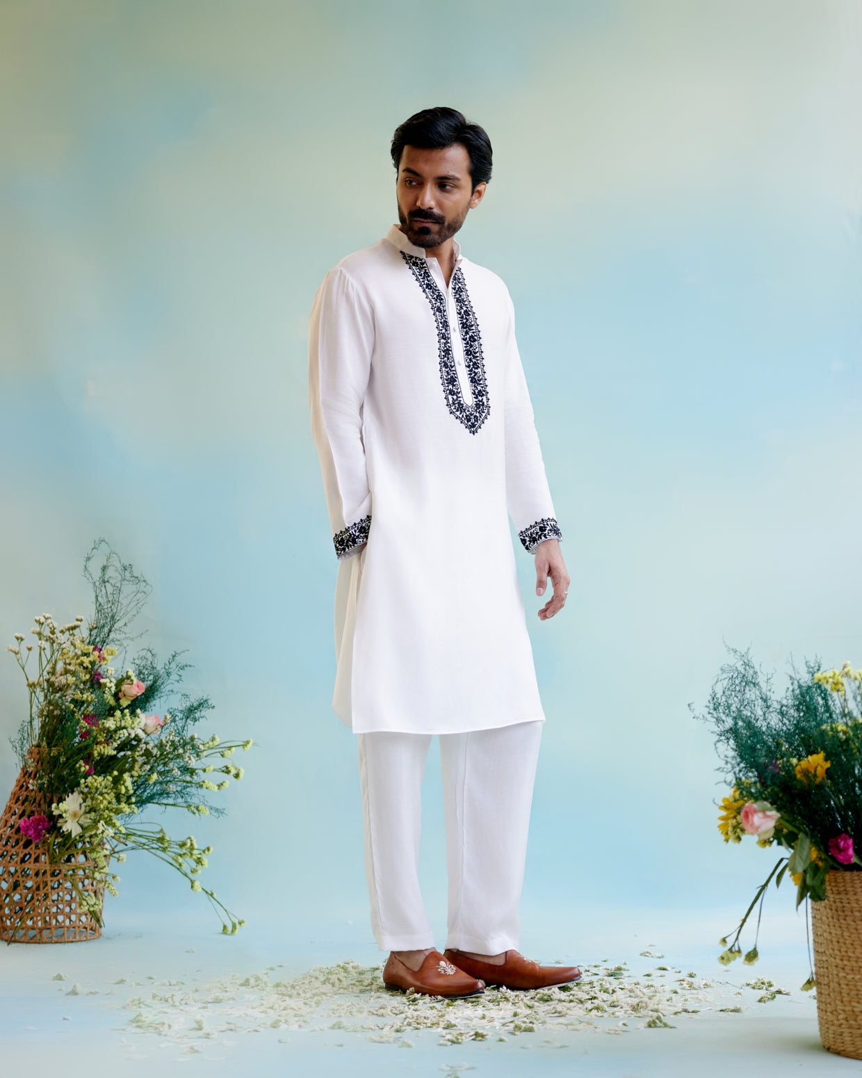 Image of White Muslin Embroidered Kurta
with Pure Cotton Narrow Pants