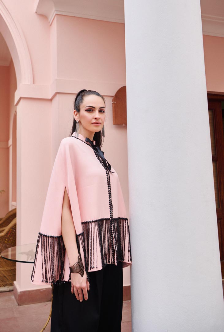 black and pink strings cape