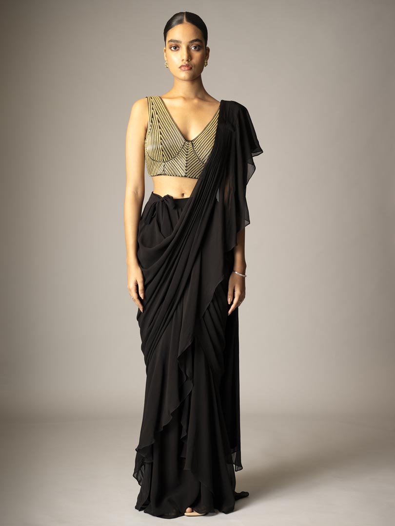 Black pre-draped saree gown
with metallic 3D dori Embellished blouse.