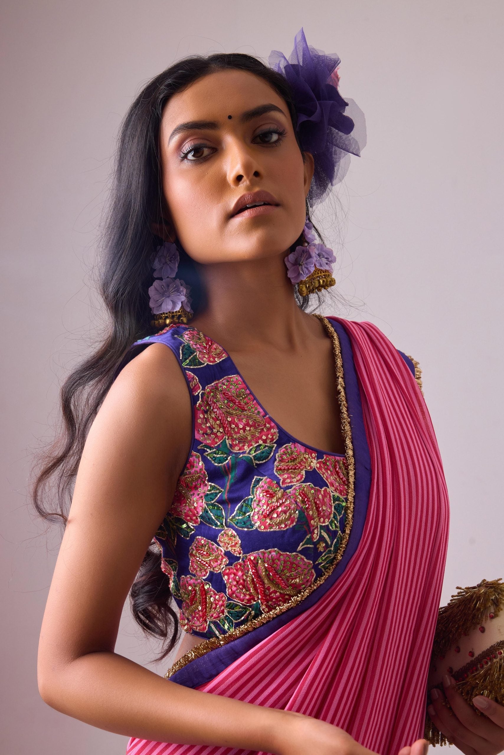 GEORGETTE STRIPED AND ROSE PRINTED SAREE WITH FRINGES DETAIL PAIRED WITH EMB. FLORAL BLOUSE