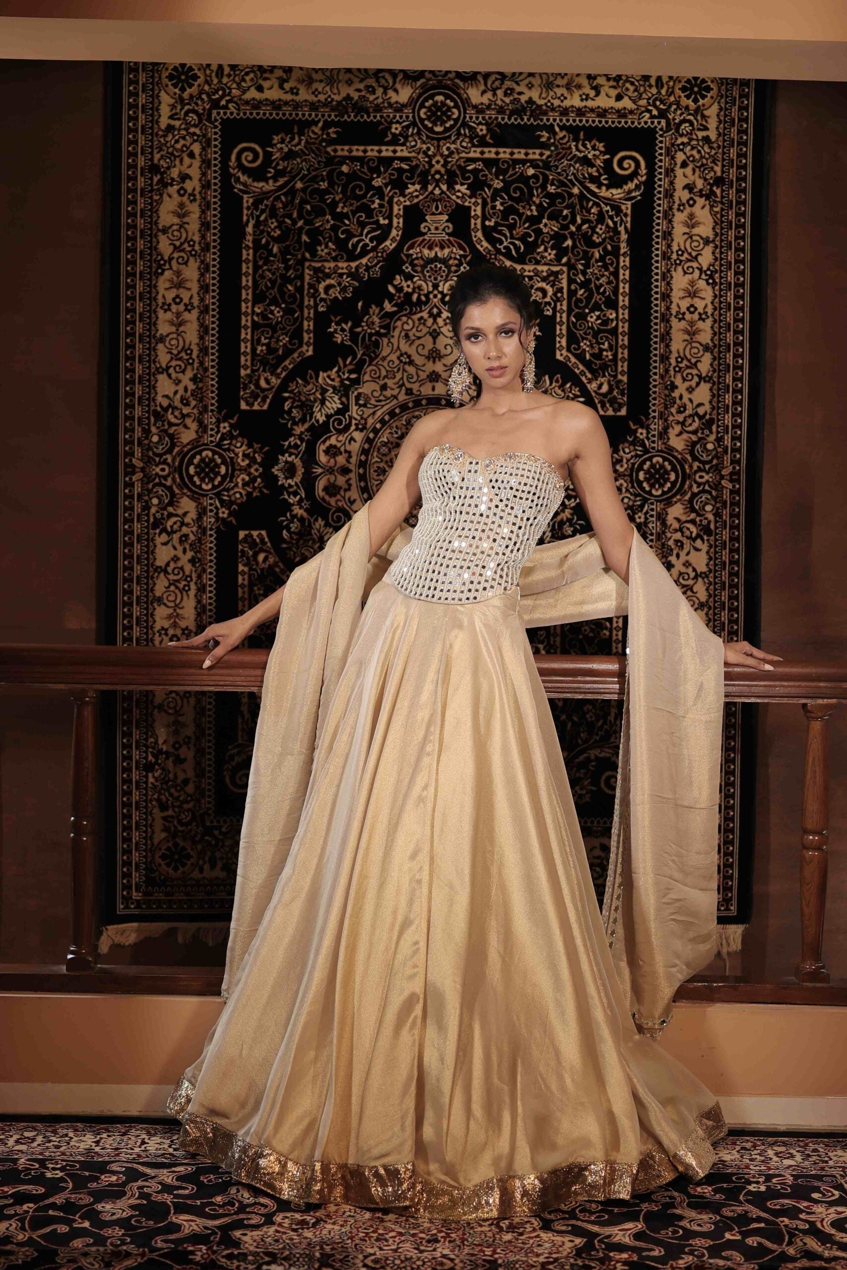 The " Sitara " spark lehenga set / Ivory-gold kundan and mirror embellished corset lehenga set