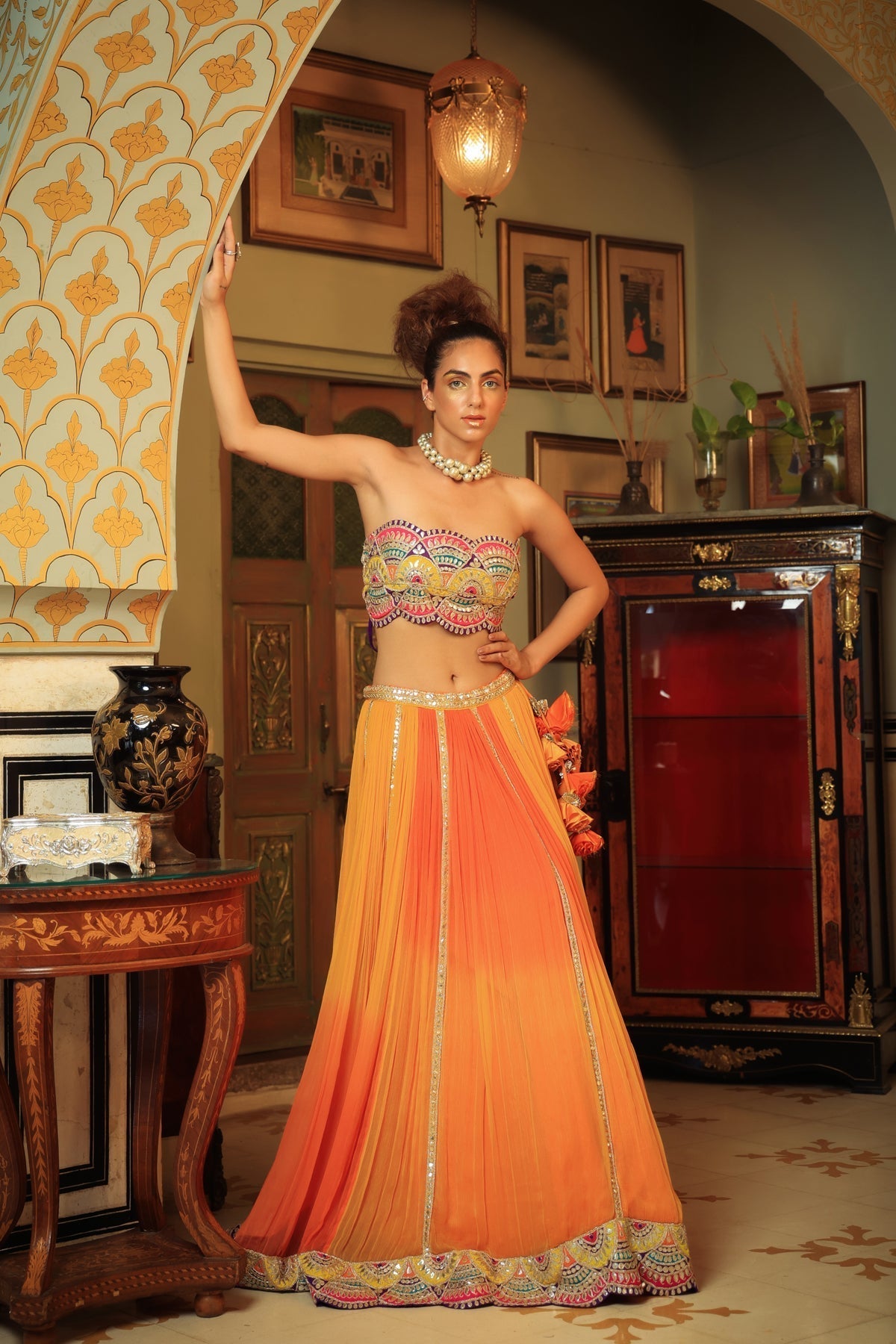 Image of Dilruba bejewelled gotapatti bandeau blouse and sunset ombre lehenga and scalloped shrug set