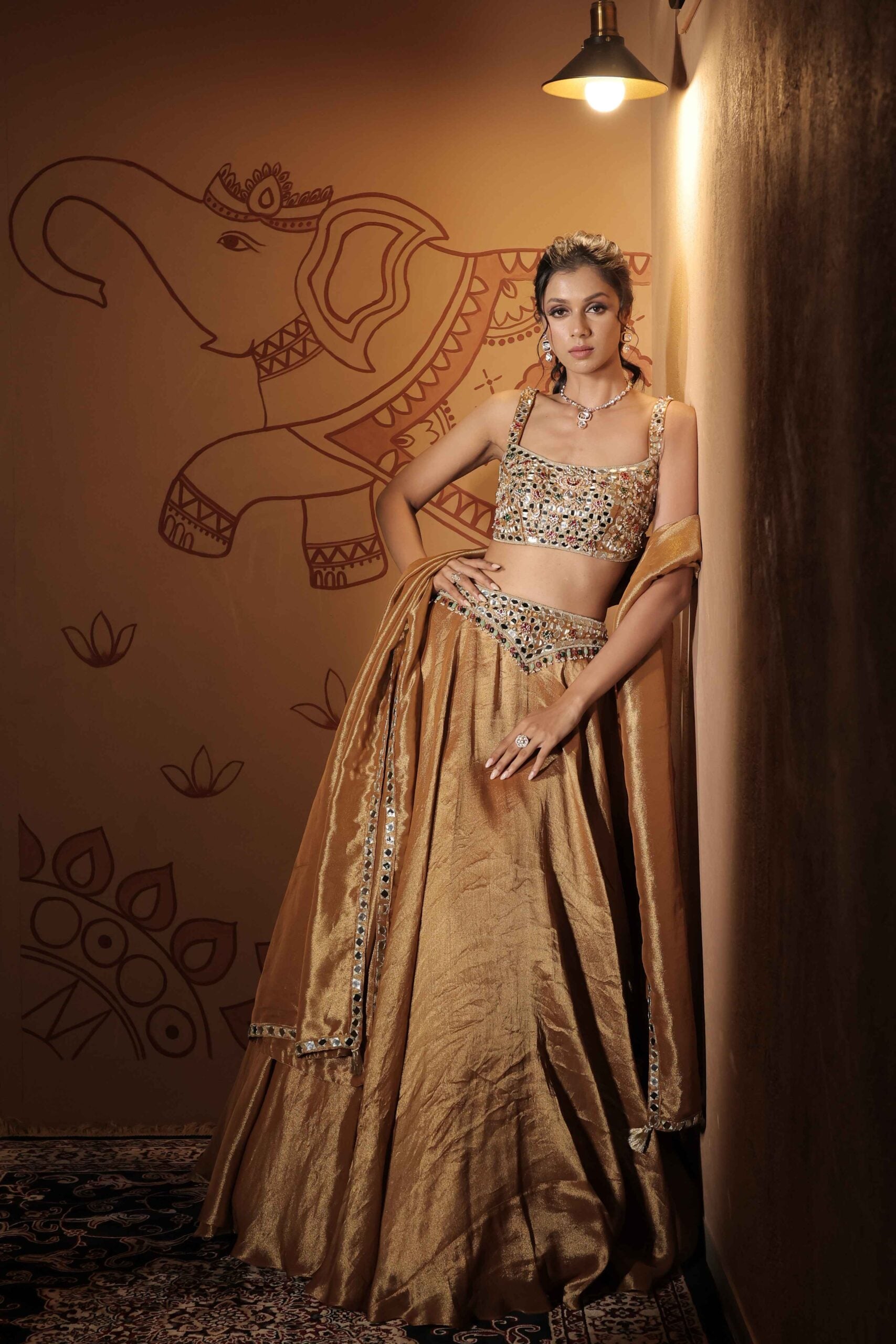 The "Kamalratna " lehenga set / Antique gold jewel and mirror embellished tissue lehenga set