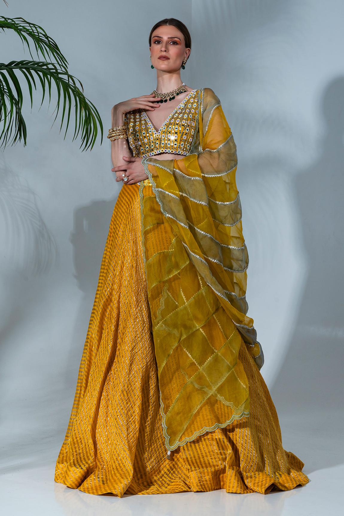 Yellow tissue silk lehenga