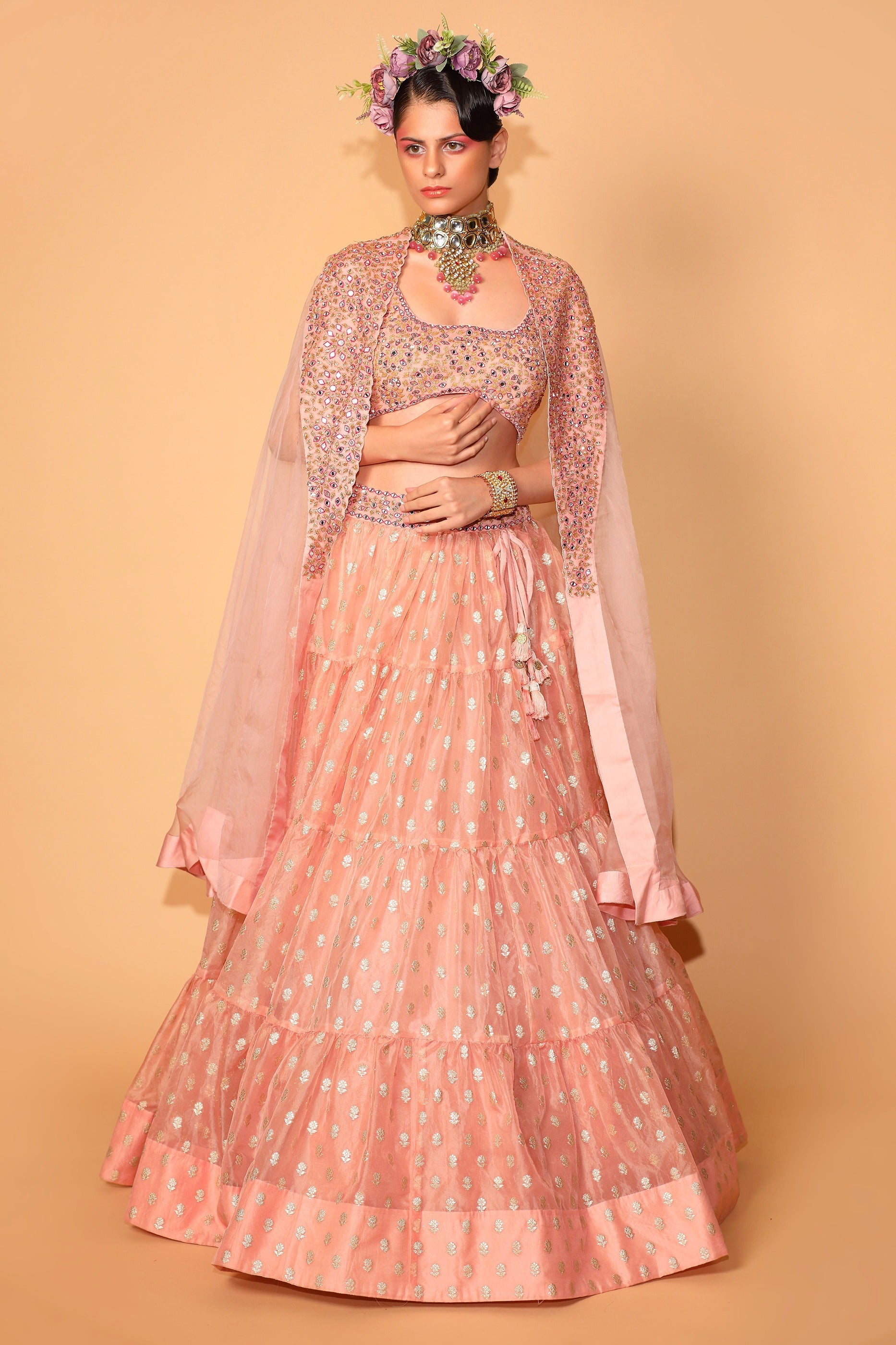 Peach Banarasi Organza Tiered Lehenga Set With Embroidered Cape