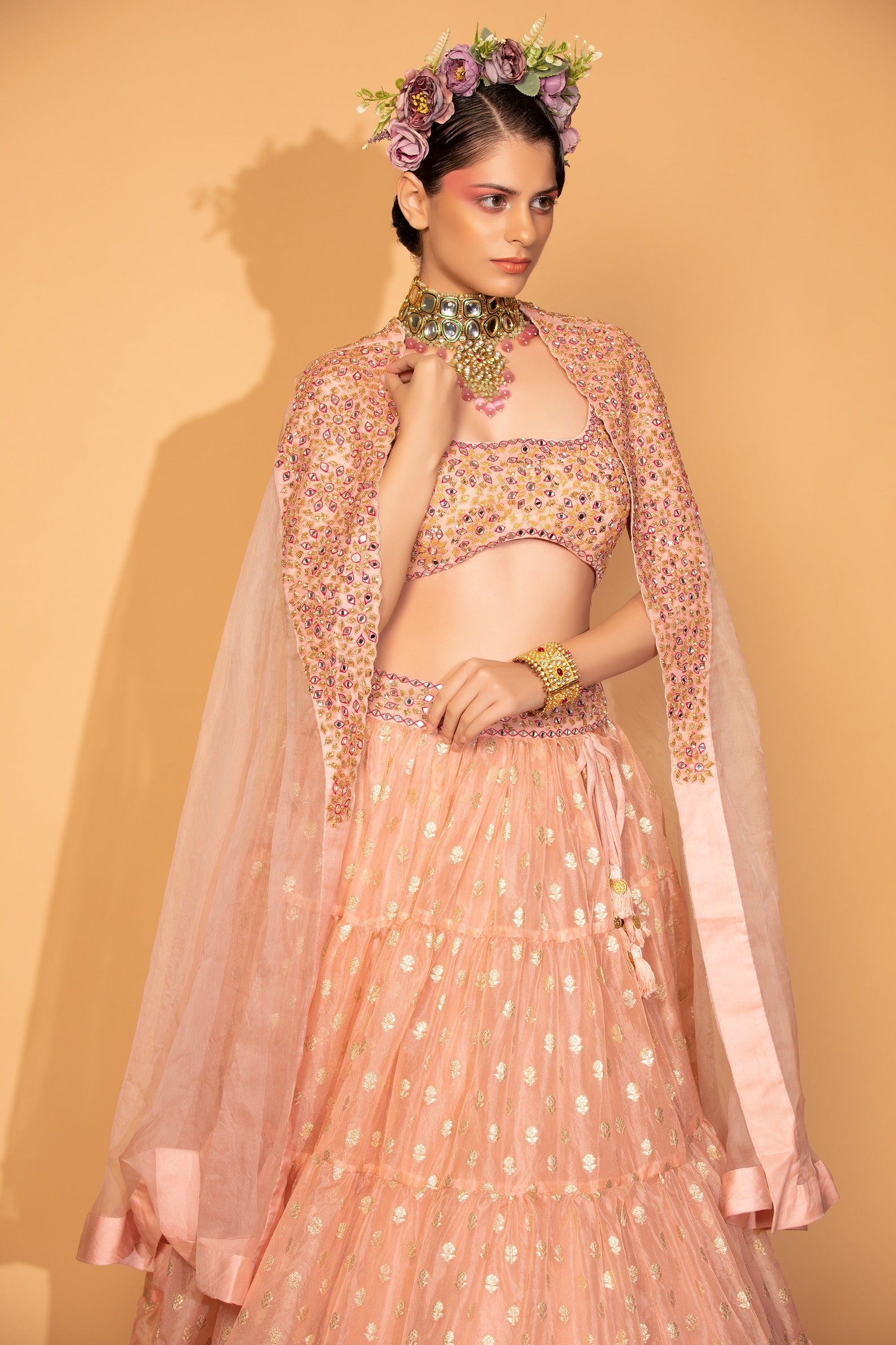 Peach Banarasi Organza Tiered Lehenga Set With Embroidered Cape