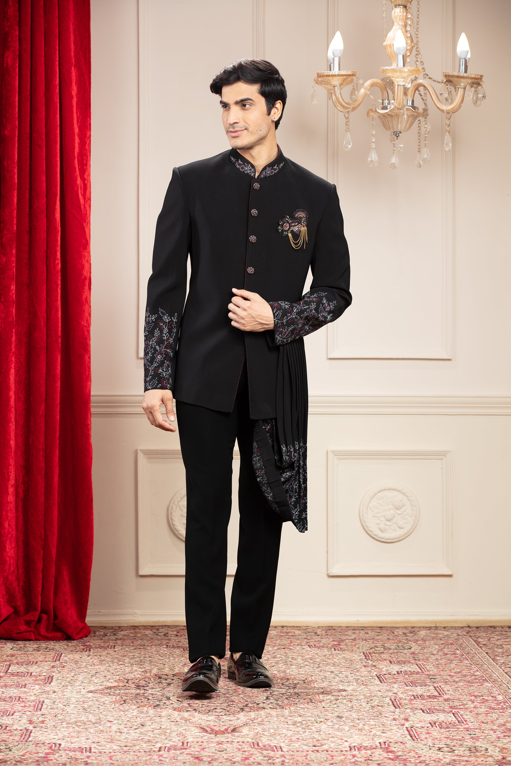 Jet Black Jodhpuri set with draping kurta, hand embroidery and embellishments