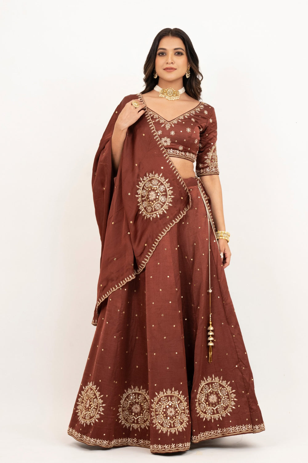 Brown soft silk zardozi embroidered lehenga choli with hand cut dana