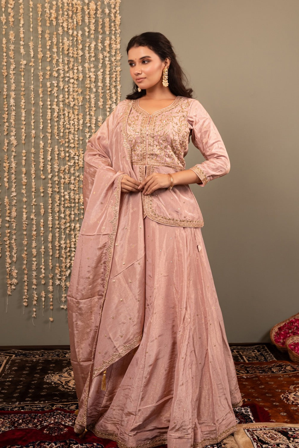 Dusty pink tissue silk lehenga choli with handwork