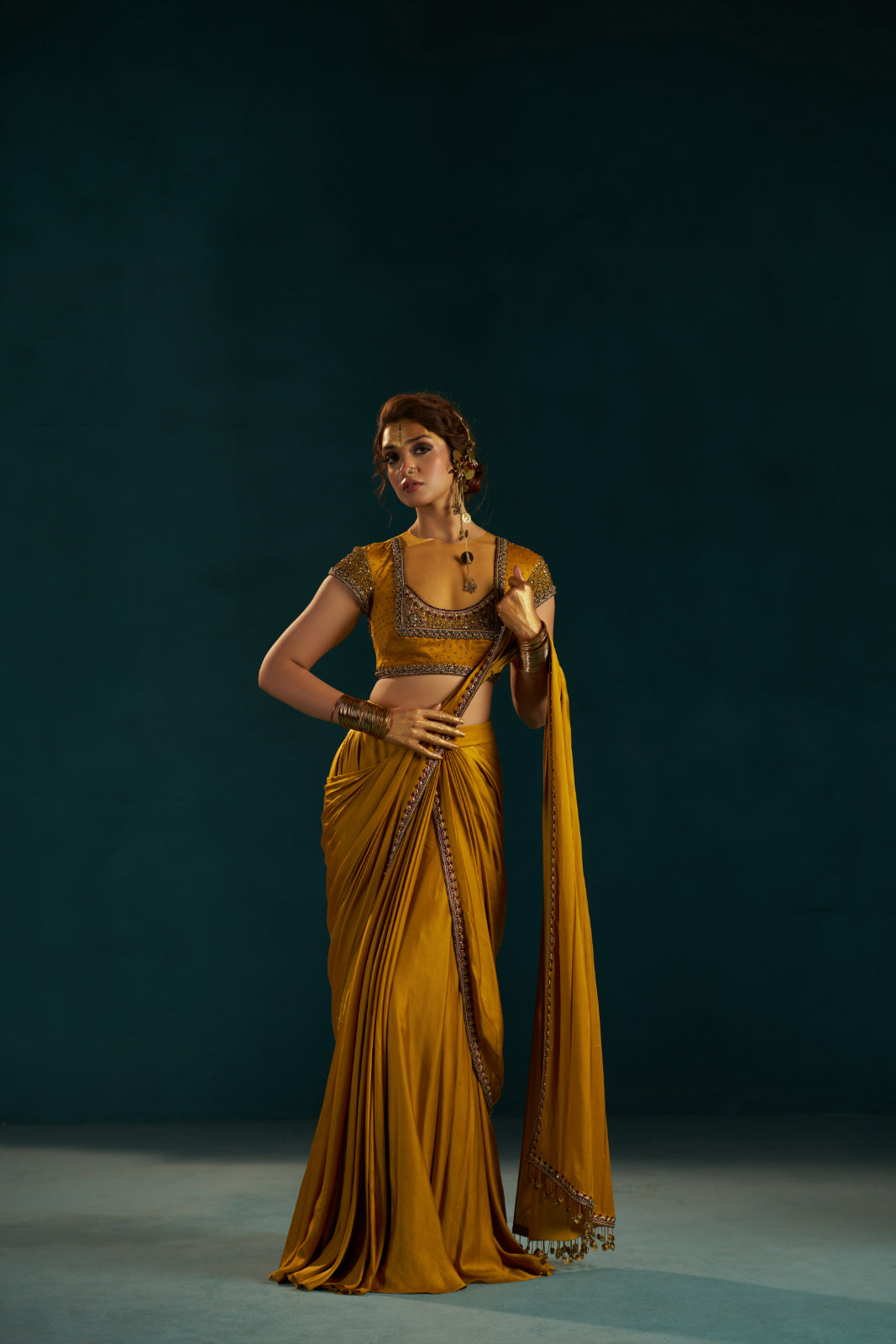 Mustard Yellow Modal Satin Drape Saree with Hand-Embellished Blouse.