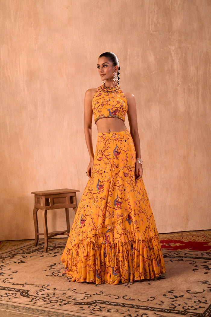 YELLOW PRINT EMBROIDERED HALTER CHOLI AND LAYERED LEHENGA SKIRT SET - image 1