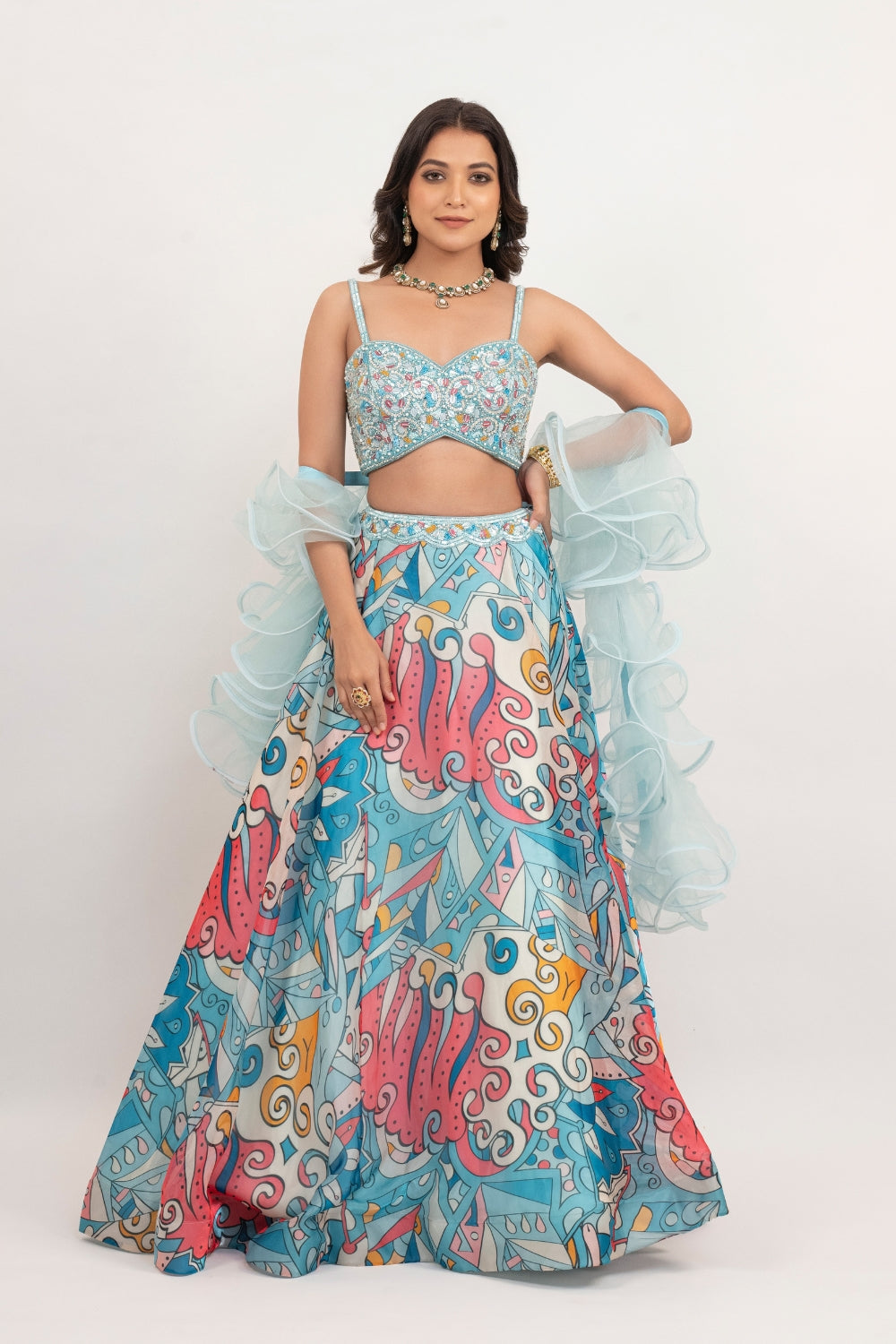 Blue organza lehenga choli with sequins work, hand cut dana work and pearls