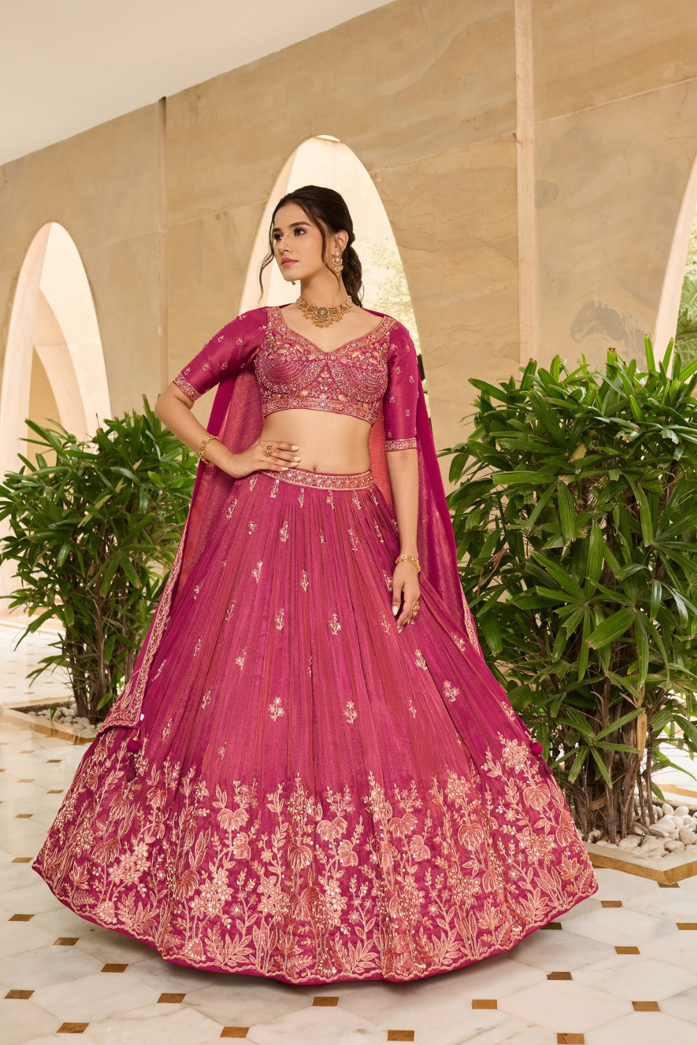 Dark fuchsia silk lehenga choli with sequins and thread work