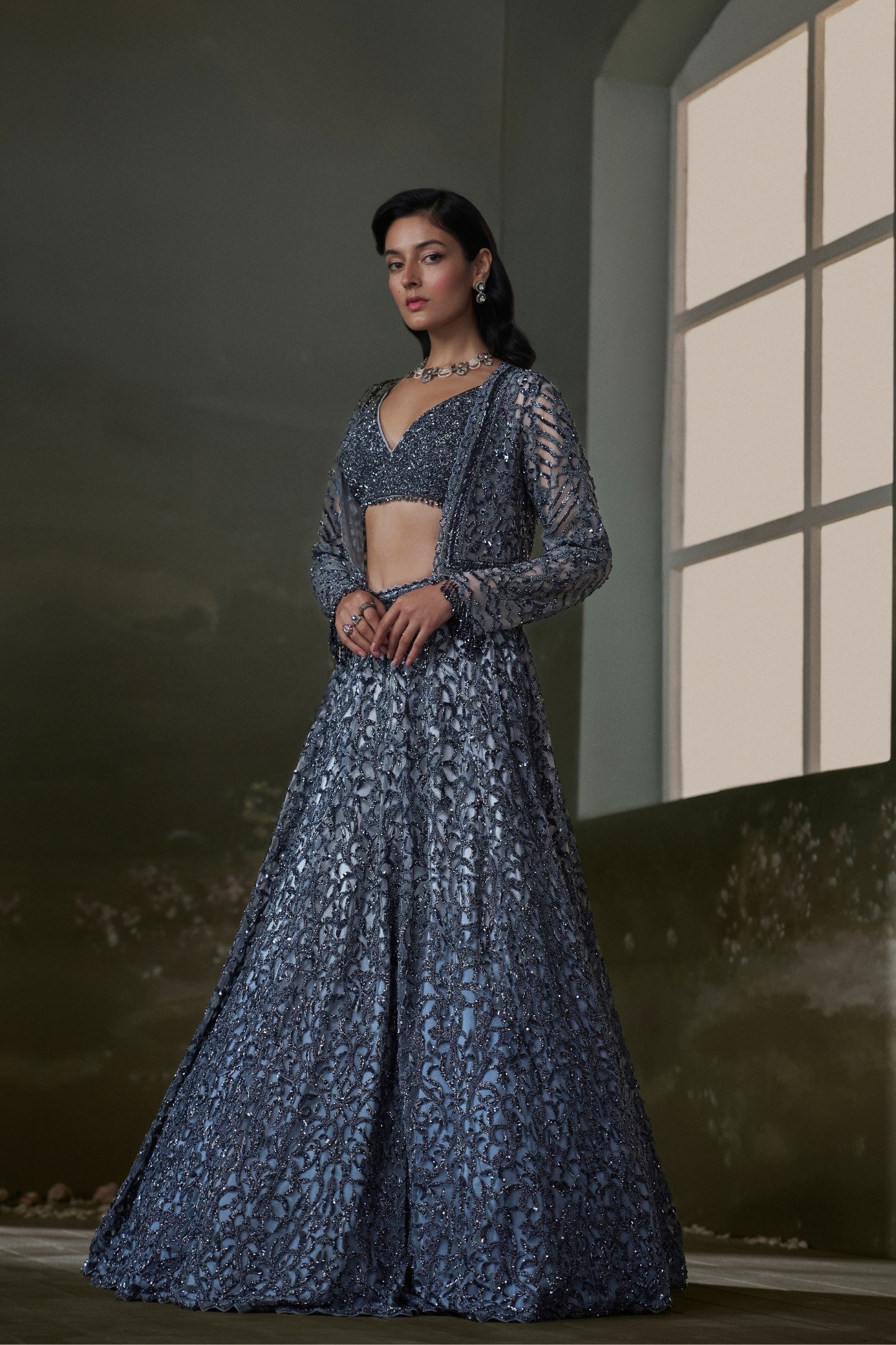 Stone Grey Net and Satin Lehenga Choli with Embroidered Jacket