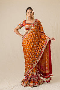 Rediant orange and red printed bandhej sari set