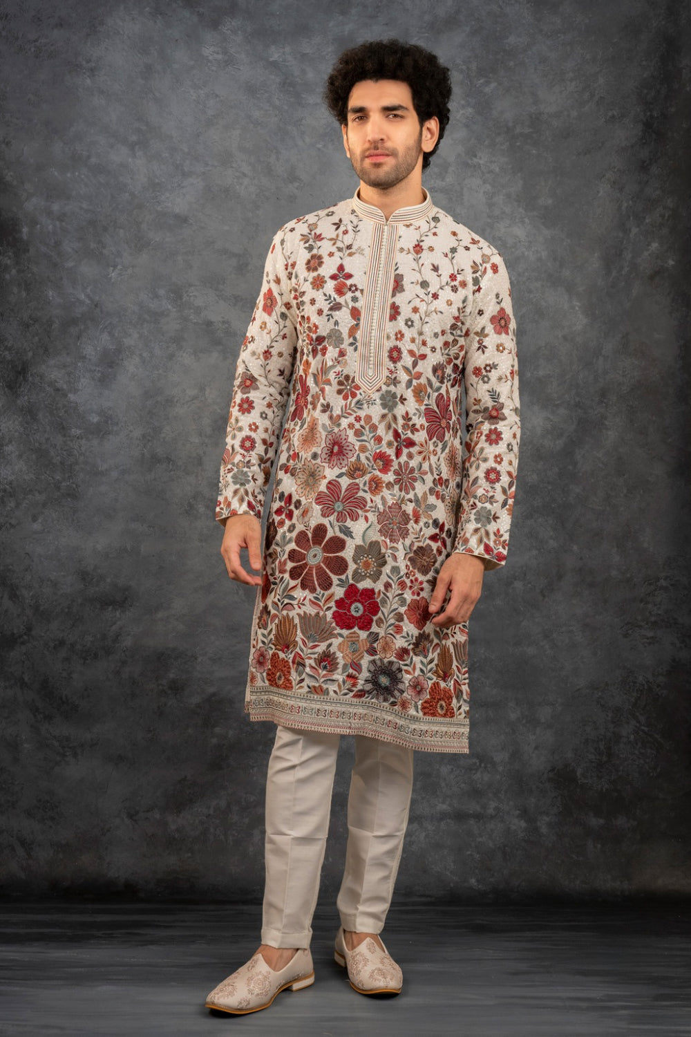 Beige silk kurta set with multicolour resham embroidery and sequins work