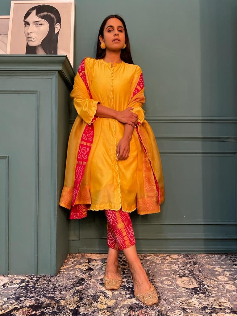 chanderi kurta with beautiful lotus embroidered motifs and gharchola pants