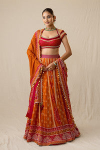 Radiant orange and red printed bandhej lehenga set