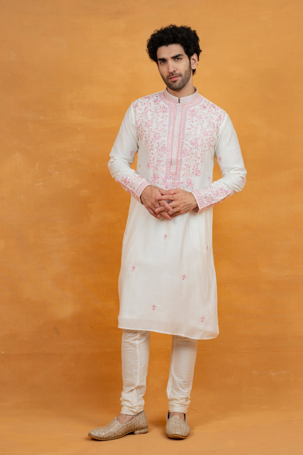 Cream silk kurta set with pink resham embroidery and mirror work