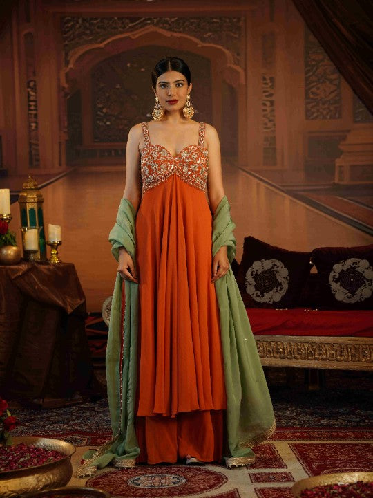 rust georgette Anarkali paired with stylish flared pants - image 1