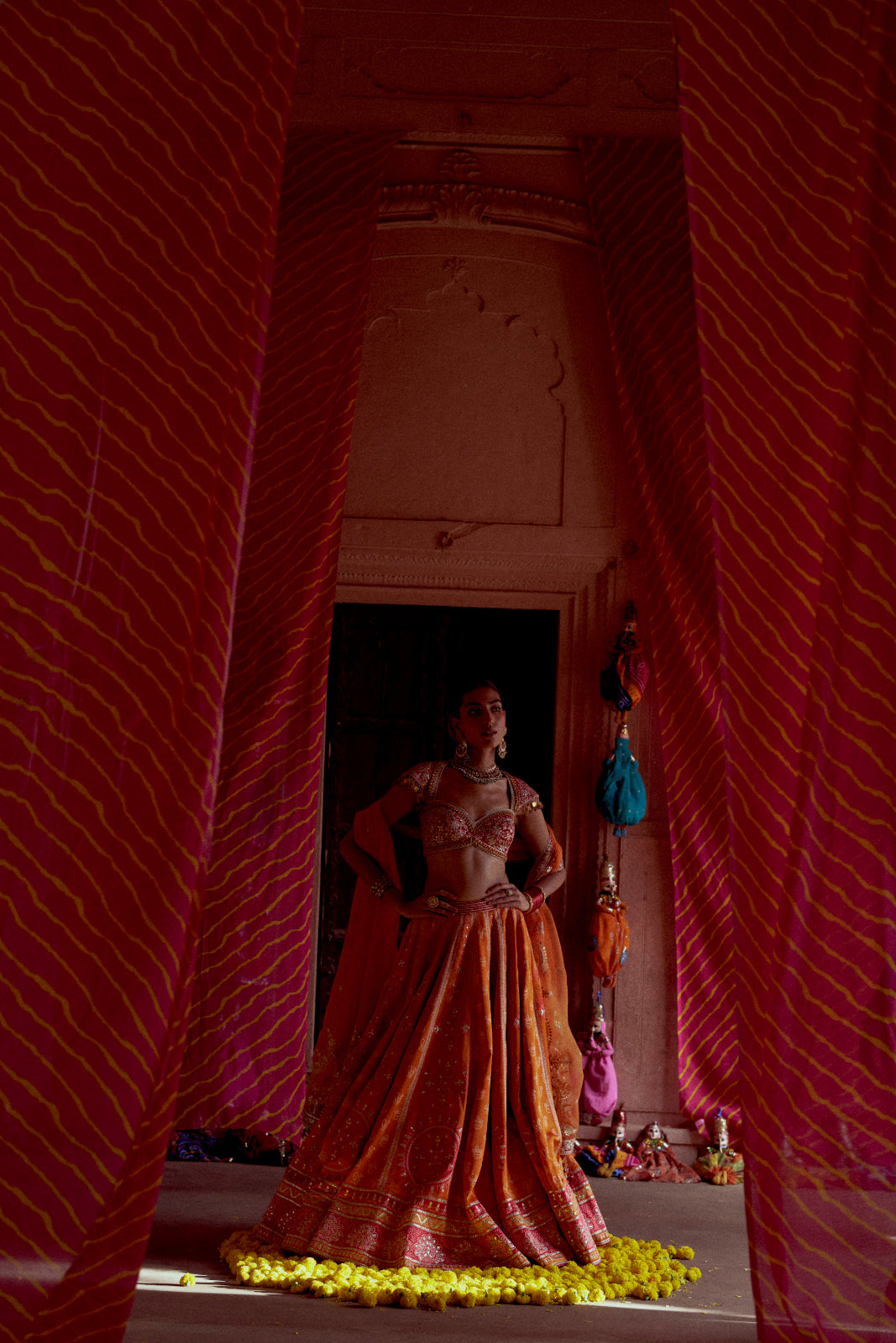 Rediant orange and red printed bandhej gota patti lehenga set