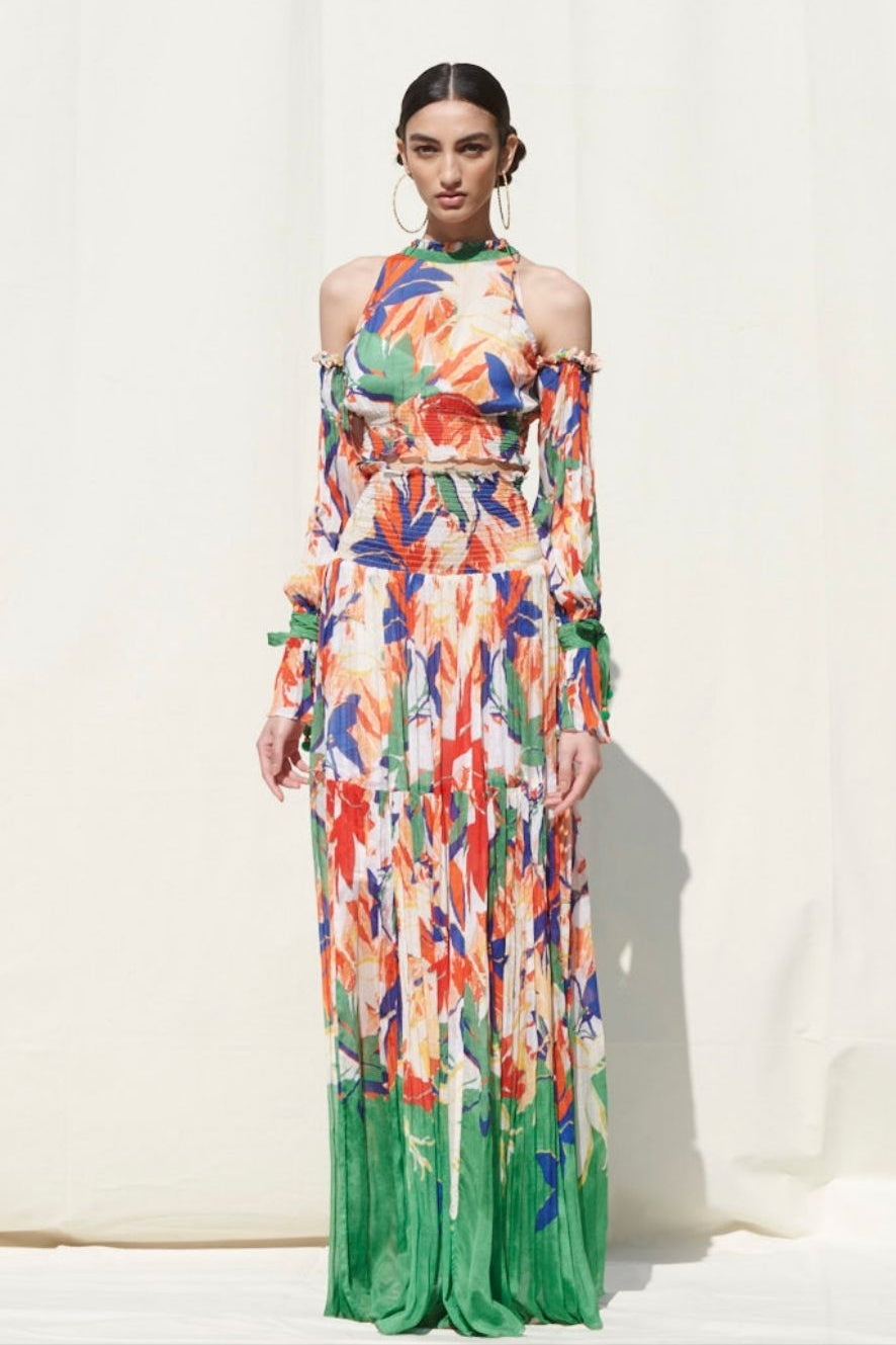 Skirts With Smocking On Its Waist Paired With A Halter Crop Top