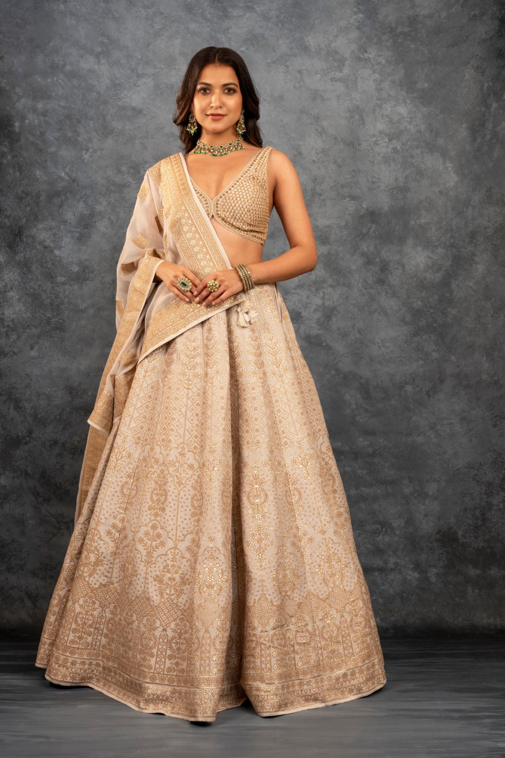 Beige banarasi silk lehenga choli with sequins, hand cut dana and dori work