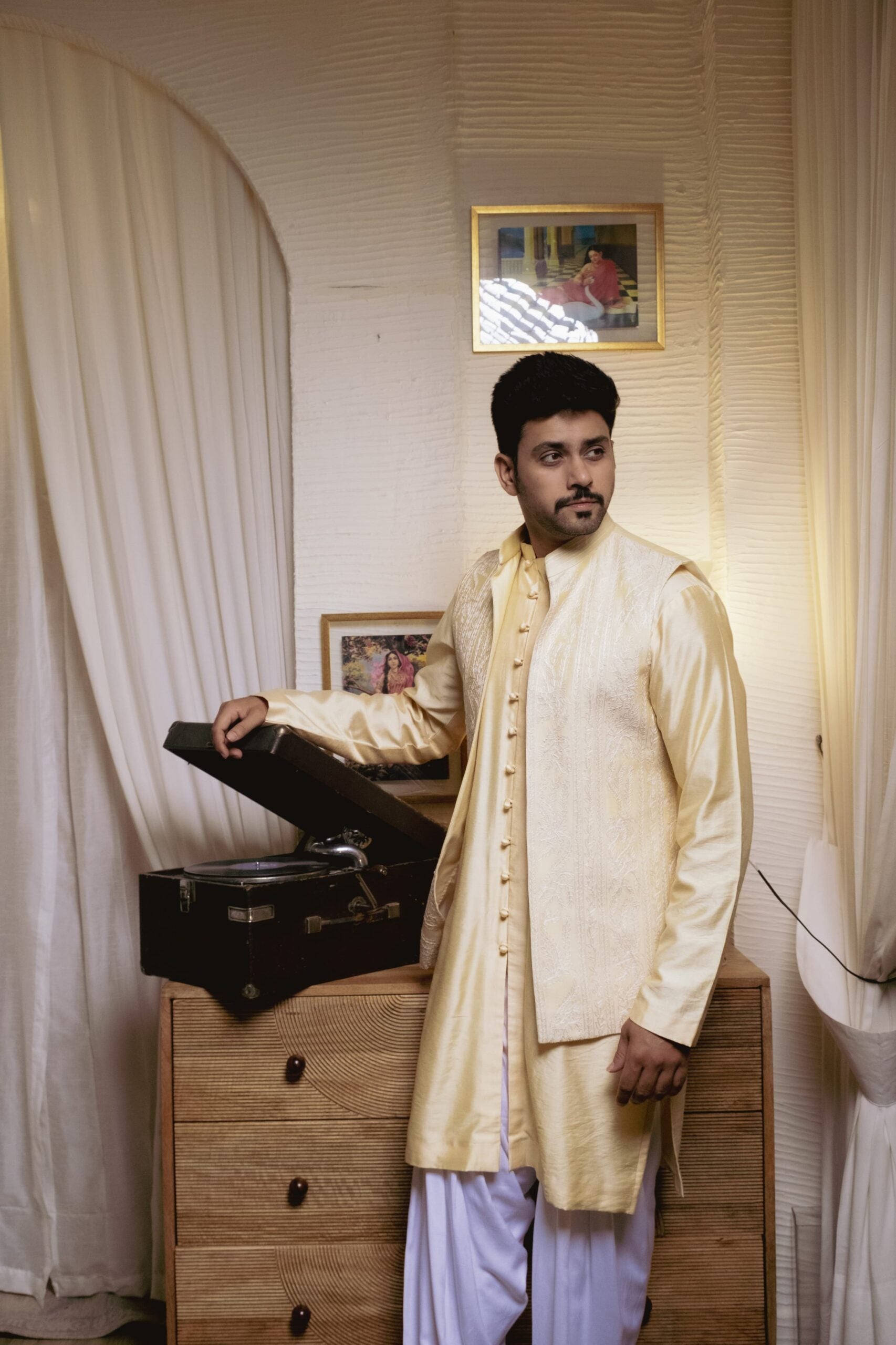 Powder yellow kurta with nehru jacket