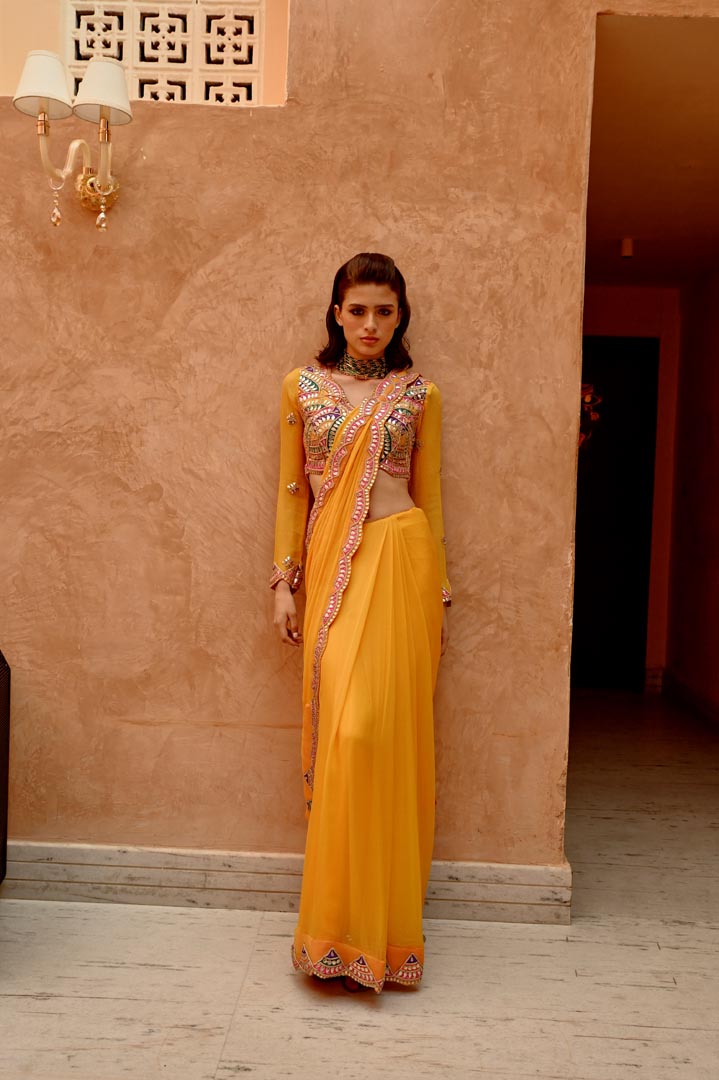 Image of Mango yellow saree with pre-stitched palla and pleats  with bejewelled jaal full sleeve blouse