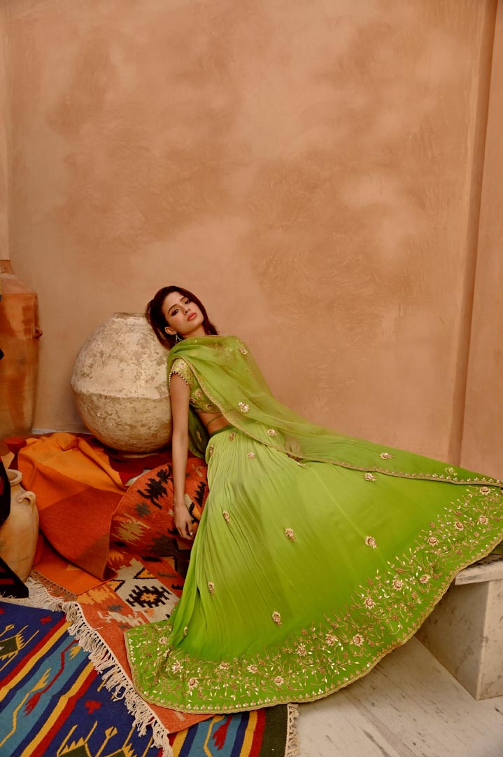 Image of Lime green ombre ruched lehenga with blouse and dupatta