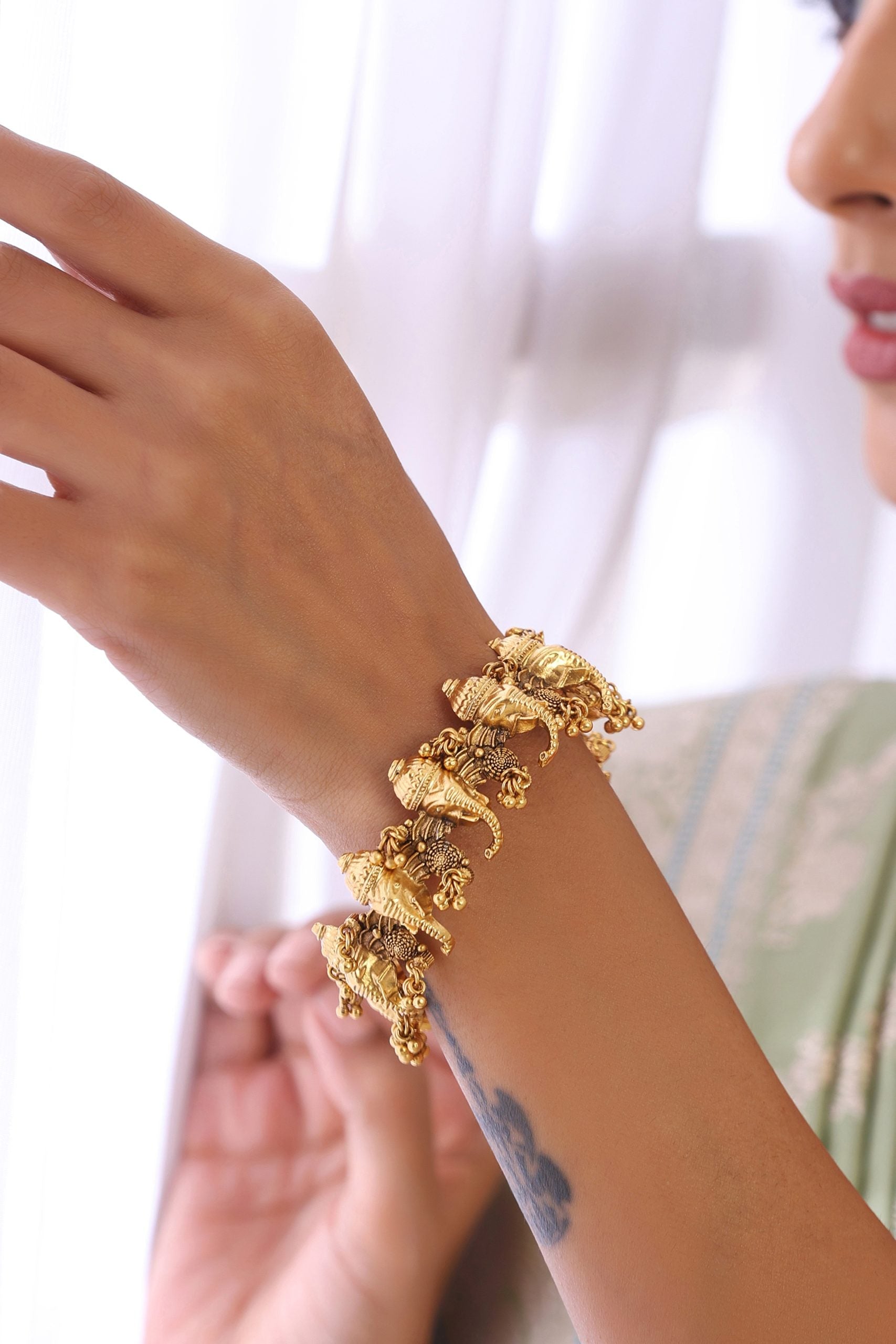 Gold Tone Temple bangle