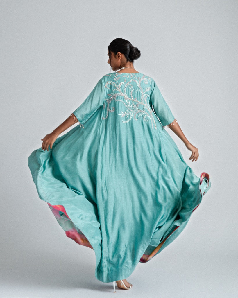 Silk mul mul tunic dress, with intricate floral patchwork, ombré organza motifs, and pockets. 