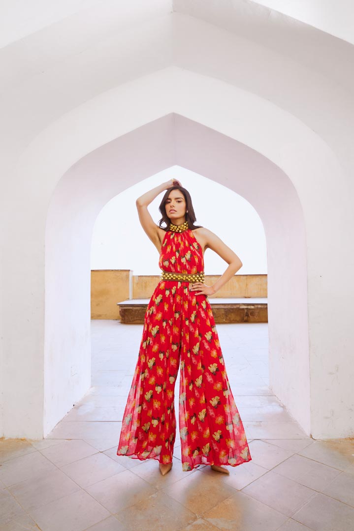 Image of Gulbahar Chilly red bell jumpsuit with belt