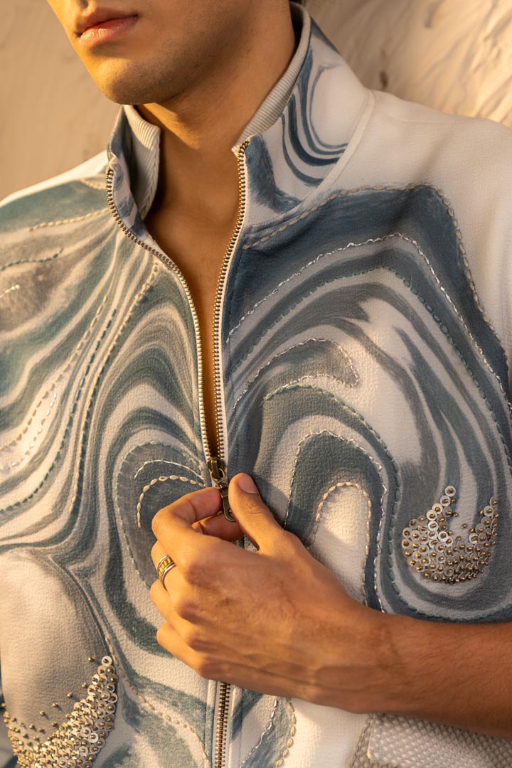 Printed wave bomber with denims